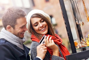 Smiling couple shopping at store during holidays