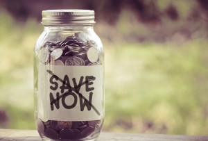 Savings jar of money with an X over it