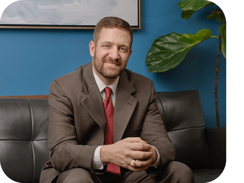 smiling man in suit